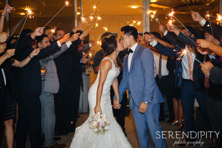 Wedding reception at the Hobby Center Houston, houston wedding photographers, bride and groom exit, hobby center wedding reception,